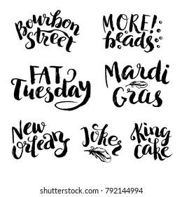 Mardi Gras lettering set. Hand drawn Fat Tuesday phrases. New Orleans, Bourbon street. King cake, Joker and beads - words for carnival party.