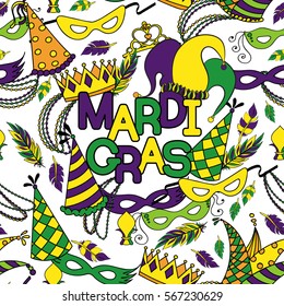 Mardi Gras seamless pattern. Colorful background with carnival mask and hats, jester's hat, crowns, fleur de lis, feathers and ribbons. Vector illustration