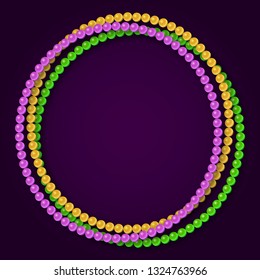 Mardi gras traditional necklaces on a dark purple background.