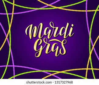 Mardi gras vector lettering logo. Mardi gras gold lettering decorated by beads in traditional colors. Lettering typography poster. Vector eps 10