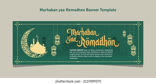 Marhaban yaa Ramadan banner template with dark green background decorated with Islamic ornaments of the mosque and lanterns with decorative frames. The design looks elegant.