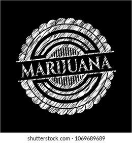 Marijuana chalk emblem written on a blackboard