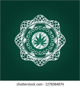 marijuana leaf icon drawn on blackboard