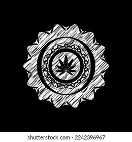 icono de la hoja de marihuana dibujado en la pizarra. 