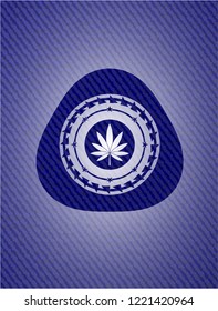marijuana leaf icon inside badge with jean texture