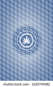 marijuana leaf icon inside blue badge with geometric pattern background.