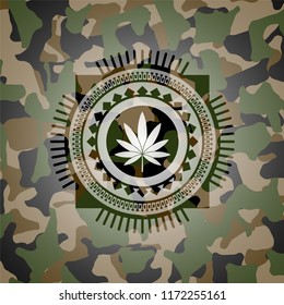 marijuana leaf icon inside camo texture