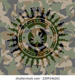 marijuana leaf icon inside camouflage emblem. 