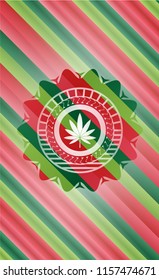 marijuana leaf icon inside christmas colors style emblem.