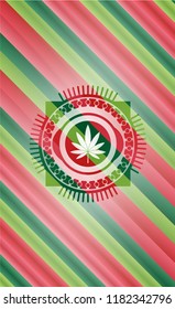marijuana leaf icon inside christmas colors emblem.