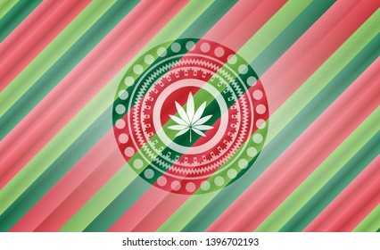 marijuana leaf icon inside christmas colors badge.