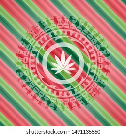 marijuana leaf icon inside christmas colors badge.