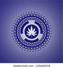 marijuana leaf icon inside emblem with jean high quality background