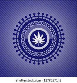 marijuana leaf icon inside emblem with jean high quality background