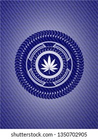 marijuana leaf icon inside emblem with denim high quality background