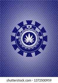 marijuana leaf icon inside emblem with jean high quality background