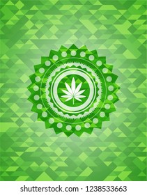 marijuana leaf icon inside green mosaic emblem