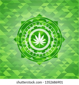 marijuana leaf icon inside green emblem with mosaic background