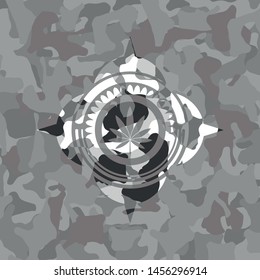 marijuana leaf icon inside grey camo texture