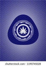 marijuana leaf icon inside jean background