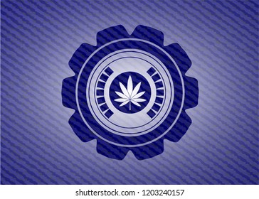 marijuana leaf icon inside jean background