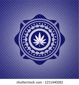 marijuana leaf icon inside jean or denim emblem or badge background