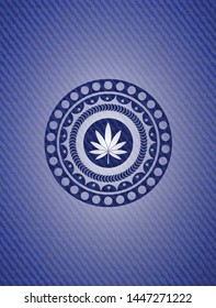 marijuana leaf icon inside jean background