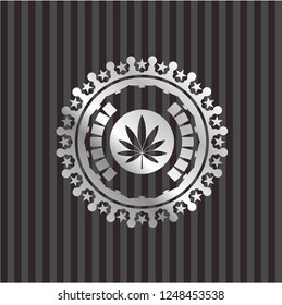 marijuana leaf icon inside silver emblem or badge