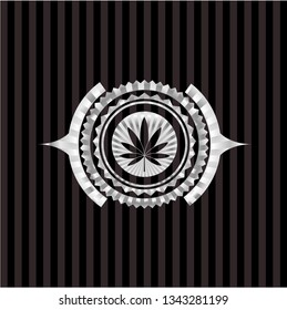 marijuana leaf icon inside silver emblem or badge