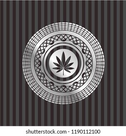 marijuana leaf icon inside silvery badge or emblem