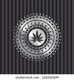 marijuana leaf icon inside silvery badge or emblem