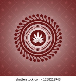 marijuana leaf icon inside vintage red emblem