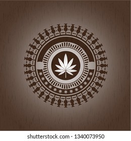 marijuana leaf icon inside vintage wooden emblem