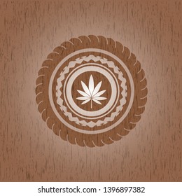 marijuana leaf icon inside wood emblem. Retro