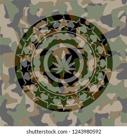 marijuana leaf icon on camo pattern