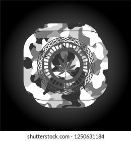 marijuana leaf icon on grey camouflaged pattern