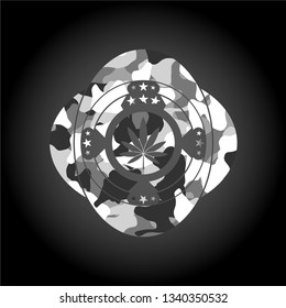 marijuana leaf icon on grey camo texture