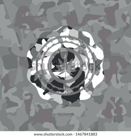 marijuana leaf icon on grey camouflage texture