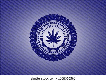marijuana leaf, weed icon inside badge with denim texture