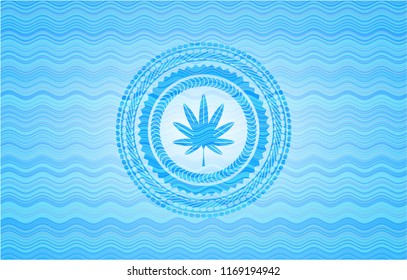 marijuana leaf, weed icon inside sky blue water wave style emblem.