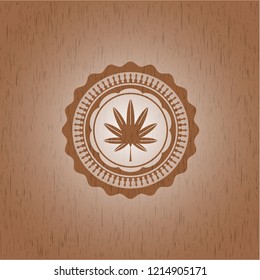 marijuana leaf, weed icon inside retro style wooden emblem