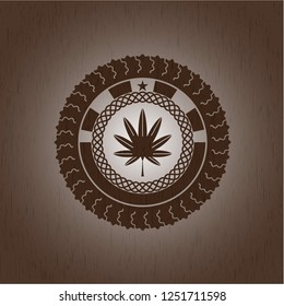 marijuana leaf, weed icon inside retro style wooden emblem