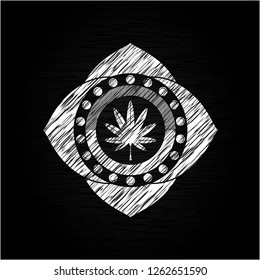 marijuana leaf, weed icon inside chalkboard emblem on black board