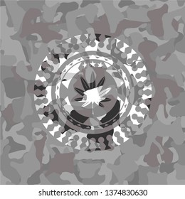 marijuana leaf, weed icon inside grey camo texture