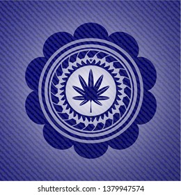 marijuana leaf, weed icon inside emblem with jean texture