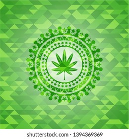 marijuana leaf, weed icon inside green emblem with triangle mosaic background