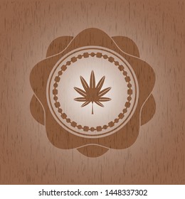 marijuana leaf, weed icon inside wood badge or emblem