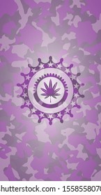 marijuana leaf, weed icon inside pink and purple camouflaged emblem