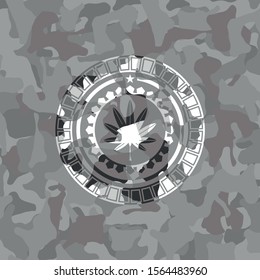 marijuana leaf, weed icon inside grey camo emblem