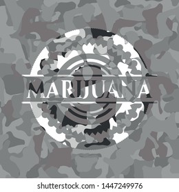 Marijuana on grey camouflage pattern